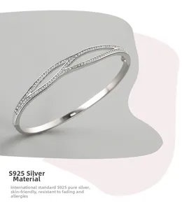 Detailed macro view showing the S925 hallmark and sparkling cubic zirconia on silver bangle