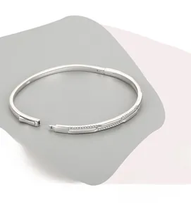 Detailed view of silver double-layer bangle with micro-pave cubic zirconia settings
