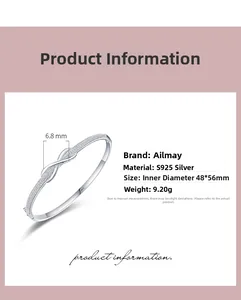 Macro shot of S925 silver infinity bracelet with sparkling bow knot pave diamonds