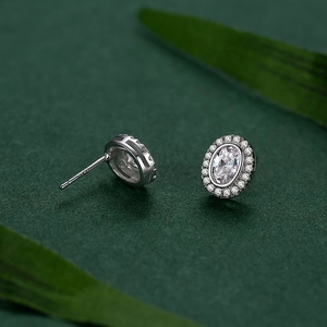 Elegant S925 sterling silver oval halo stud earrings featuring sparkling cubic zirconia