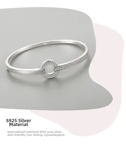 Detailed close-up of S925 sterling silver bangle with pavé-set cubic zirconia circle