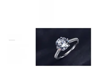 Detailed view of polished S925 silver ring with 6-prong setting and side micro-pavé accents