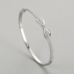 Elegant S925 sterling silver infinity knot bangle with sparkling pavé cubic zirconia