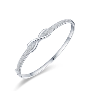 S925 sterling silver infinity bangle with bow design and sparkling pavé cubic zirconia
