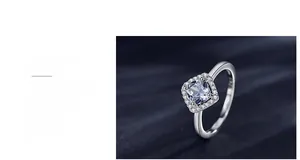 Macro shot of S925 sterling silver ring with square halo cubic zirconia and claw setting