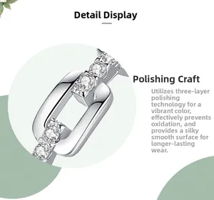 Macro detail of S925 sterling silver chain ring with cubic zirconia and polished finish
