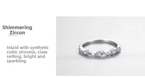 Detailed view of s925 silver ring featuring baguette and round cubic zirconia in claw setting