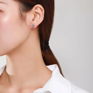 S925 sterling silver bubble stud earring with round zircon on female model's ear