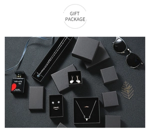 Elegant matte black jewelry gift boxes for rings and necklaces on dark premium background