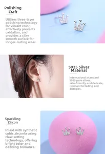 Detail of S925 sterling silver crown earrings with cubic zirconia and prong setting