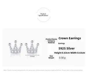 Macro detail of S925 sterling silver crown stud earrings with clear zircon stones