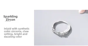 Close-up of sparkling cubic zirconia stones in a claw setting on a 925 silver ring