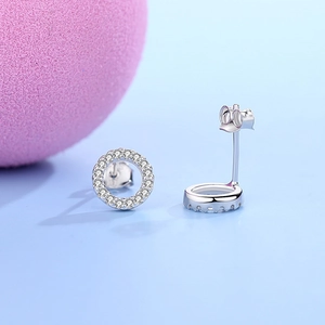 S925 sterling silver hollow hoop earrings with pavé cubic zirconia on pink decor