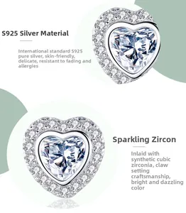 Detailed view of S925 sterling silver heart stud earrings with cubic zirconia stones