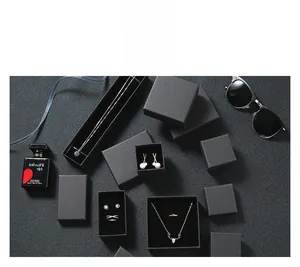 Chic black matte jewelry gift boxes featuring elegant floral s925 silver rings and necklaces