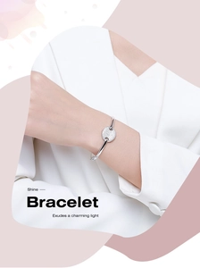 Detail of s925 silver bracelet with sparkling round pave-set cubic zirconia disc