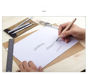 Artistic hand-drawn design sketch of a curved diamond stud earring on a wooden desk