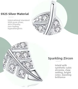 Macro detail of S925 sterling silver leaf earring with cubic zirconia in prong setting