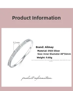 Detail view of S925 sterling silver bangle showing 5.2mm width and engraved texture