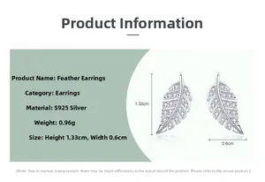 Macro detail of S925 silver feather stud earring with dimensions 1.33cm by 0.6cm