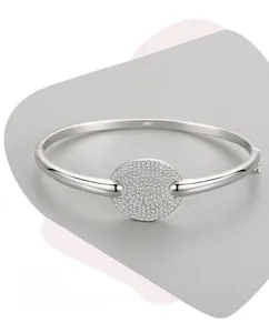 Detailed view of polished S925 silver bracelet featuring a circular pavé zircon setting