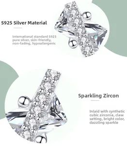 Macro view of S925 sterling silver earring featuring prong-set cubic zirconia stones