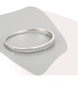 Detailed macro view of S925 sterling silver open bangle with paved stones and hallmarks