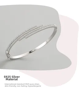 Macro shot of micro-paved cubic zirconia rows on S925 sterling silver open bangle