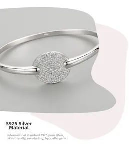 Macro shot of S925 sterling silver cuff featuring a micro-pave pig nose design