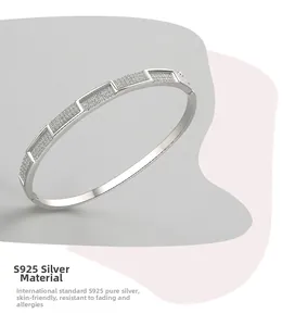 Detailed macro view of S925 sterling silver geometric bracelet with sparkling pave zircon