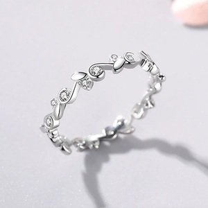 Elegant S925 sterling silver vine ring with micro-set sparkling crystals on a wavy band