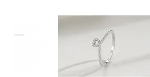 Detail of 925 sterling silver heart ring showing triple-layer polished finish and micro-inlay