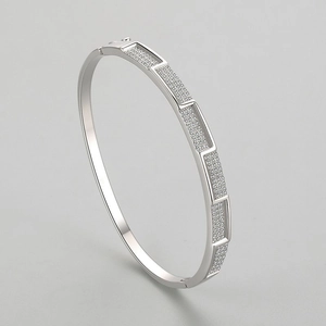 Elegant s925 silver open bangle with pavé-set rectangle zircon segments in minimalist style
