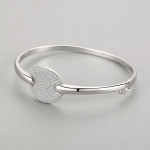 Polished S925 sterling silver open bangle featuring a sparkling round zircon pave disc