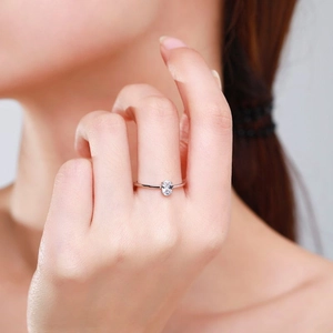 Classic S925 silver ring featuring an oval-cut solitaire zircon on a slender band