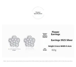 Macro shot of 0.6cm S925 sterling silver flower earrings with pavé set cubic zirconia