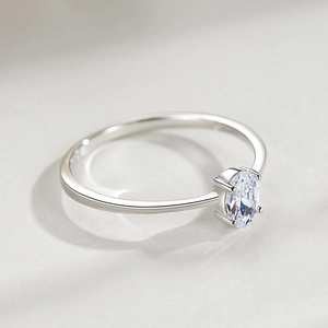 Minimalist S925 silver ring featuring an oval-cut zircon in a classic four-prong setting