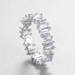 Elegant S925 sterling silver eternity ring featuring baguette-cut sparkling crystals