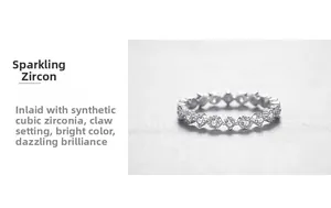 Close-up of sparkling cubic zirconia prong setting on a 925 silver eternity ring