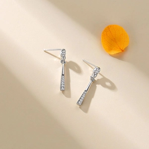 Elegant S925 sterling silver long drop earrings with micro-set zircon on beige background