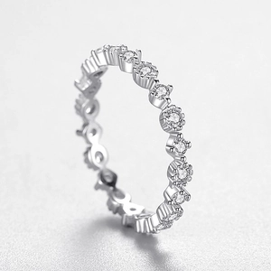 Elegant 925 sterling silver eternity ring featuring small round cubic zirconia stones