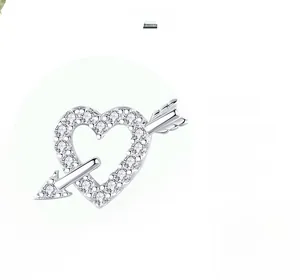 Detailed macro view of silver heart earring featuring micro-pave cubic zirconia finish