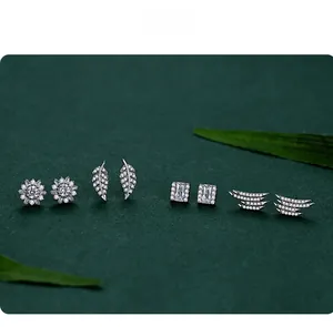Detailed view of s925 silver geometric stud earrings with crystal zirconia accents