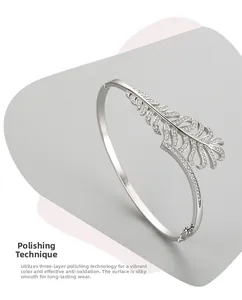 Detailed view of s925 silver feather bangle with cubic zirconia and three-layer polishing