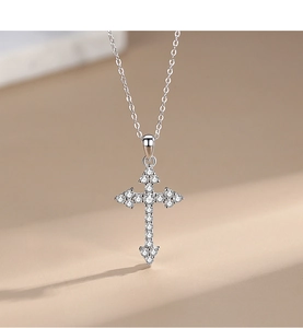 Detailed view of 925 sterling silver cross pendant necklace with sparkling pavé crystals
