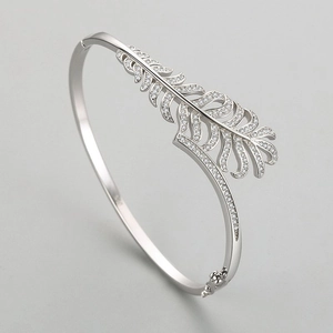 S925 sterling silver open feather bangle with pavé crystals and engraved hallmarks