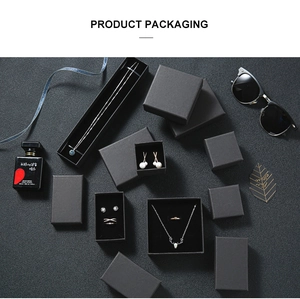 Various black frosted jewelry gift boxes with foam inserts for necklaces and rings