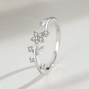 Elegant S925 sterling silver flower ring with zircon stones in a minimalist open design