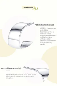 Detailed macro view of S925 sterling silver C-shape earring with mirror polished finish