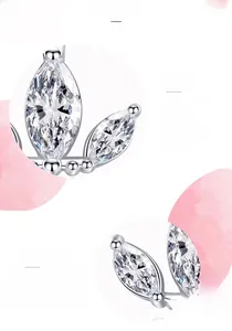 Detailed macro view of S925 sterling silver leaf earring with marquise cut stones